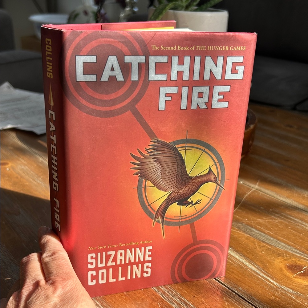 Catching Fire by Suzanne Collins - Red Hardcover Edition